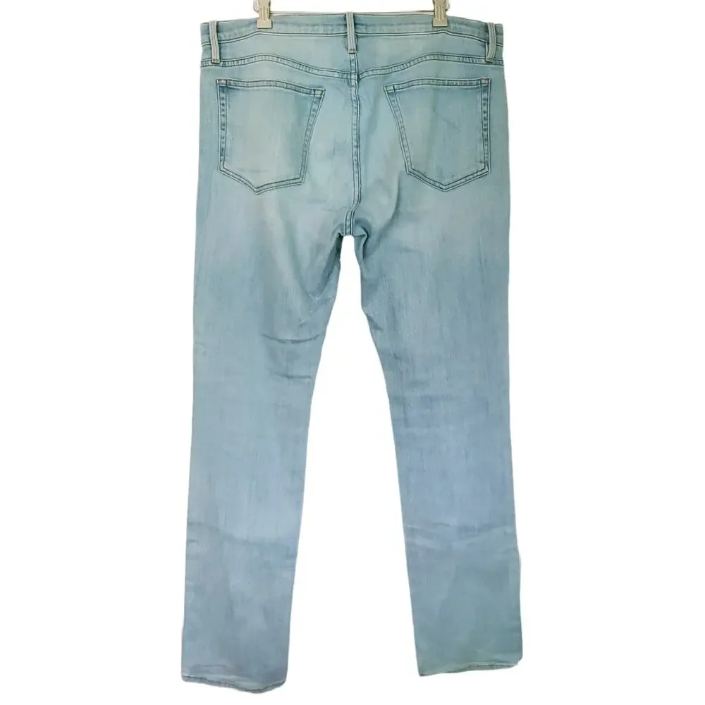 FRAME Denim L'Homme Slim fit distressed mid rise straight tapered jeans Finn 36